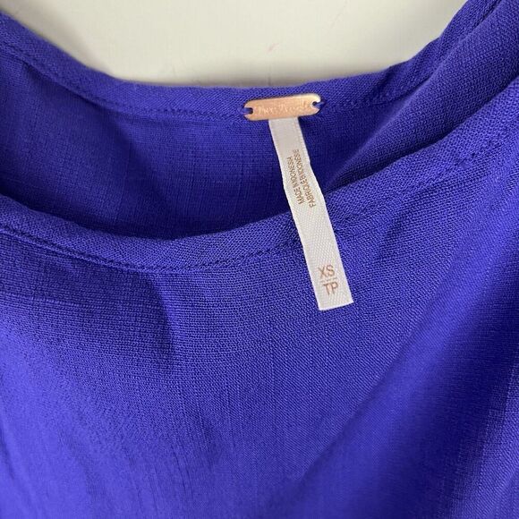 FREE PEOPLE Sz XS CLEAR SKIES ASYMMETRIC HEM COLD SHOULDER TUNIC VIOLET … - Picture 5 of 6